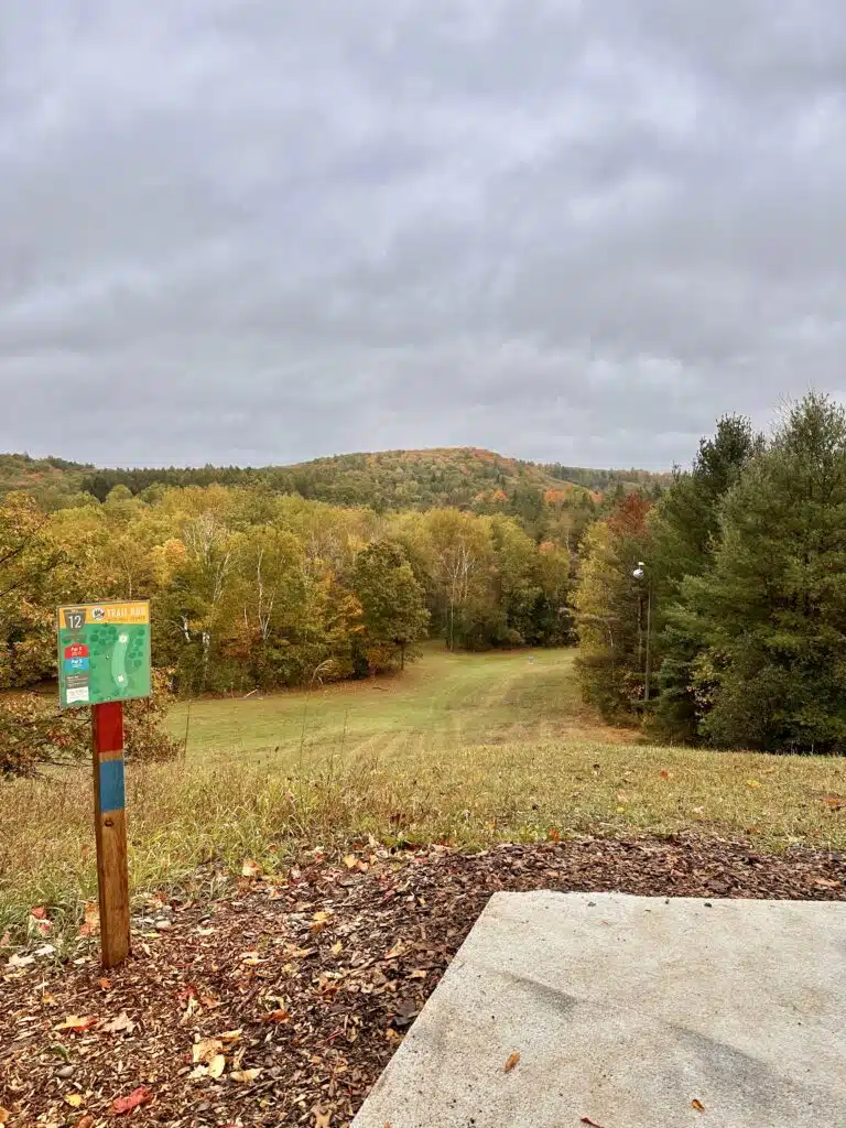 View of a disc golf hole at Trail Hub Disc Golf