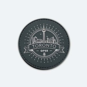 Velcro patch with an off-white TORONTO OPEN logo, set on a black background.