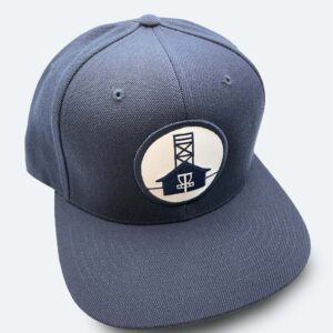 Classic dark blue 6 panel snapback hat with flat brim and blue Beaches Disc Golf Course logo patch on a white background.